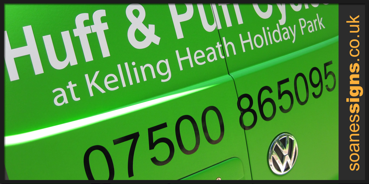 Vehicle wrap vinyl and graphic text applied as green racing stripe to back doors and bonnet of Huff and Puff Cycles VW Transporter