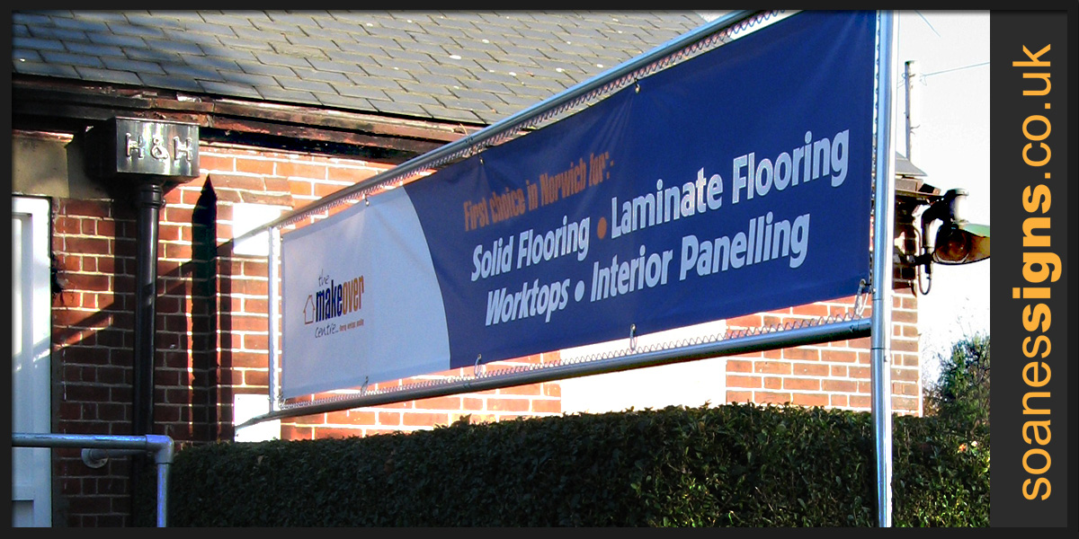 Printed banner within bespoke made stainless steel tube frame with elasticated ties for The Makeover Centre Norwich