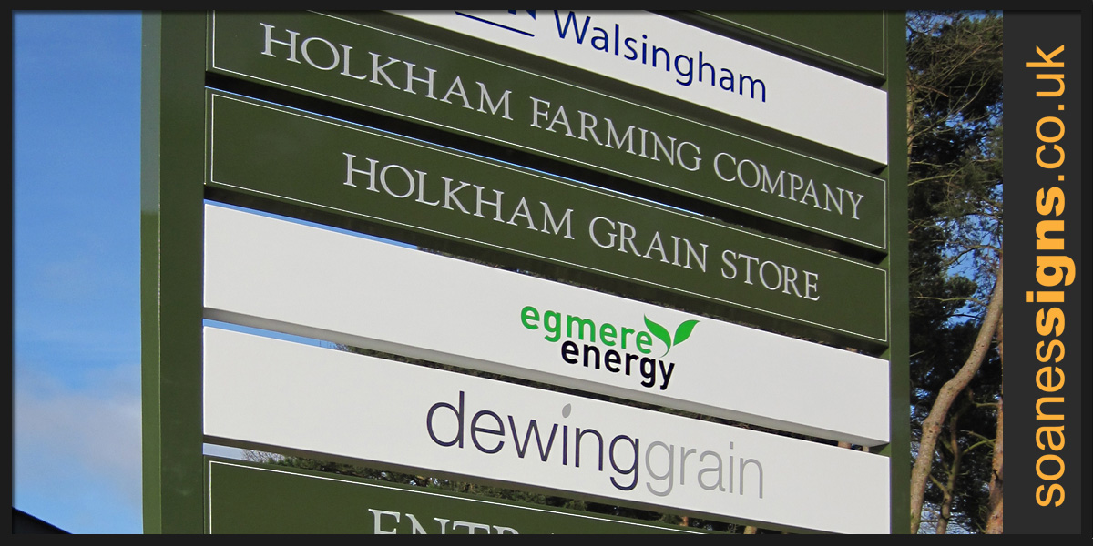 Site directory sign with shaped and powder coated aluminium panels with reflective and applied graphics attached to square posts installed for Holkham Farming Company