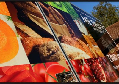Details of full vinyl print applied to the box sides of Mr Fruity Iveco Truck with supporting vinyl brand graphics