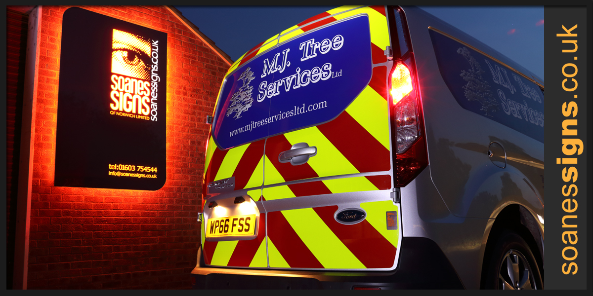 Reflective vinyl chevrons kit, with printed and cut vinyl graphics applied to MJ Tree Services Ford Transit Connect